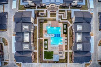Resort style pool complete with cascading water features